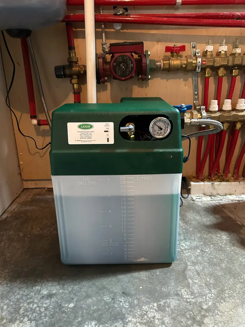 Axiom MF200 glycol feeder and hydronic manifold on an in-floor heating system