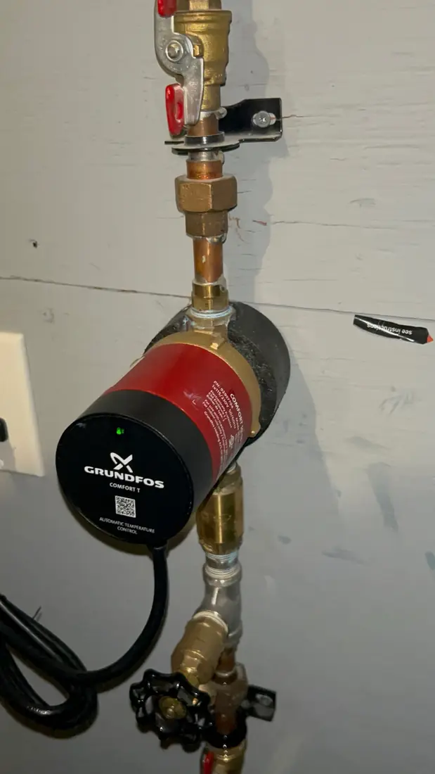 Grundfos Comfort T hot water recirculation pump installed on copper