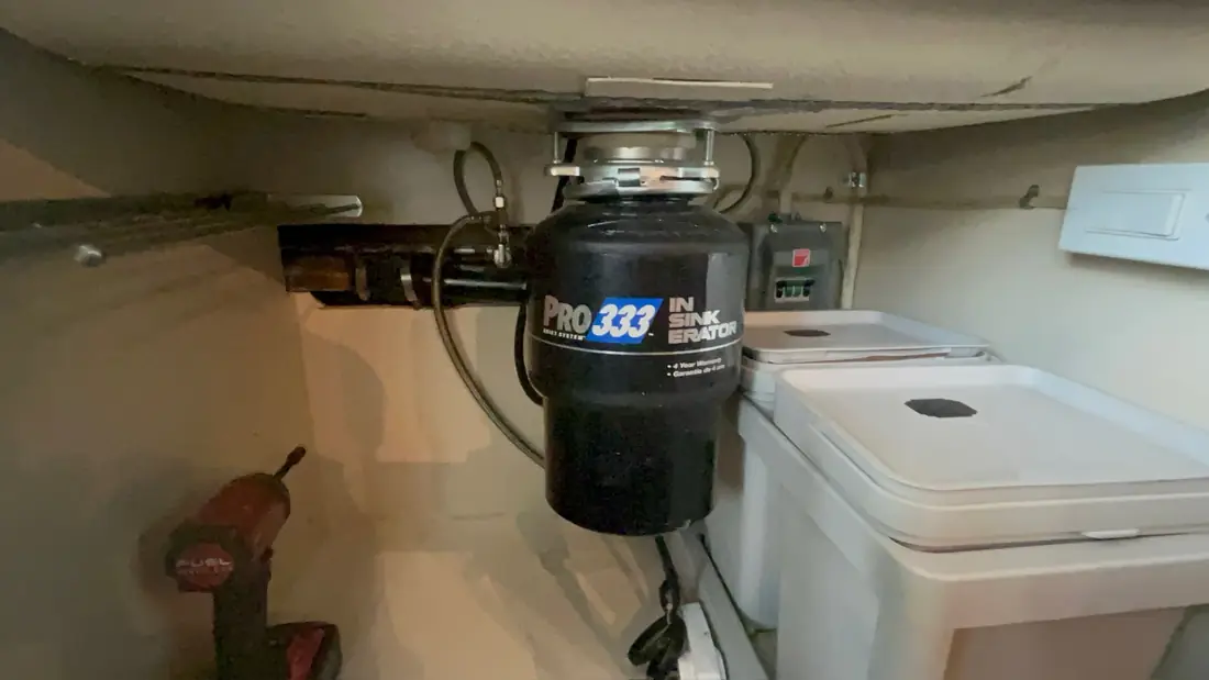 InSinkErator PRO 333 garburator mounted under a kitchen sink
