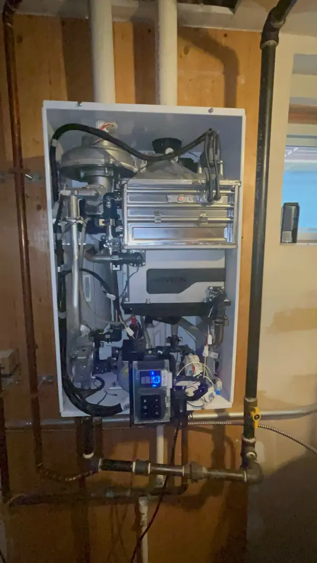 Navien tankless water heater opened up for servicing