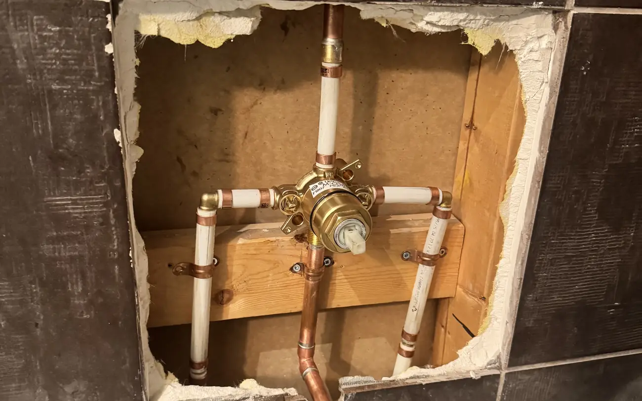 Shower valve rough-in with copper and PEX supply lines